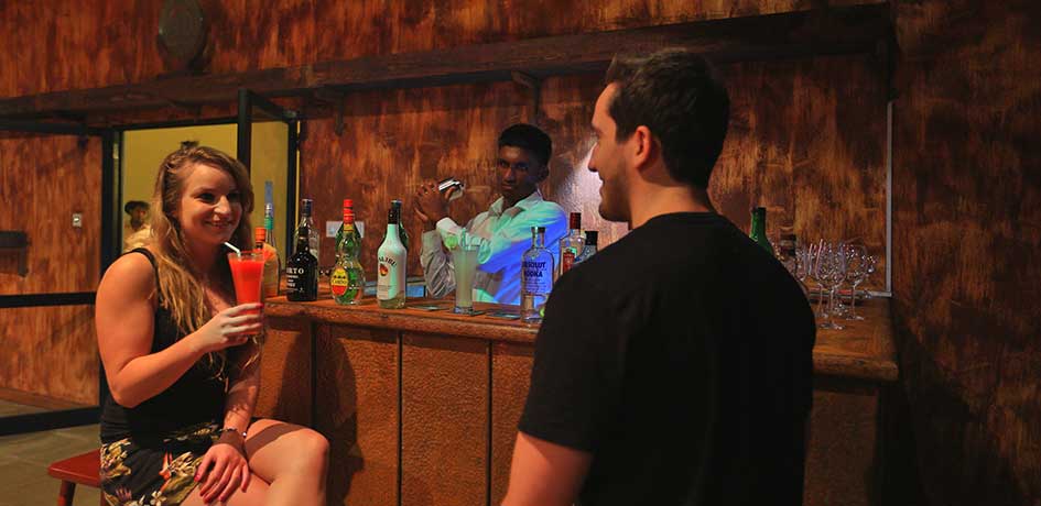 Guests enjoying premium spirits at the bar